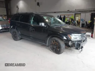 2013 Dodge Journey SXT with VIN 3C4PDDBG0DT660956, listed as a IAAI auction lot 41593385 with 196,021 mi miles and . Bid and sale history available at DreamBid. Image 1.