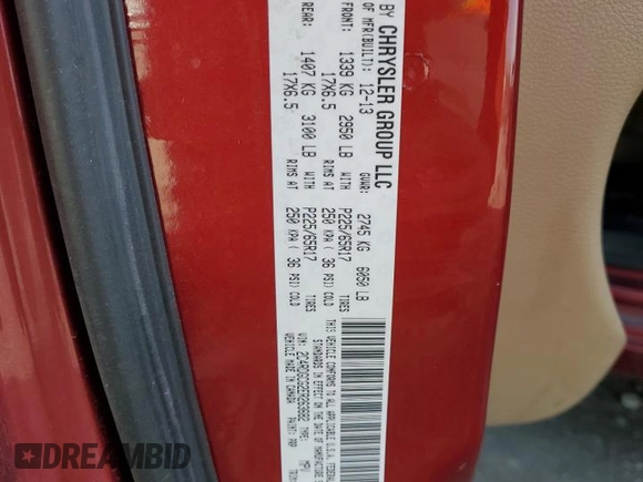 2014 Dodge Grand Caravan SXT with VIN 2C4RDGCG2ER263682, listed as a Copart auction lot 51060795 with 90,951 mi miles and Non Repairable. Bid and sale history available at DreamBid. Image 13.