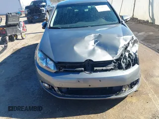 2013 Volkswagen Golf TDI z VIN WVWDM7AJ0DW137139, wystawiony jako IAAI lot #41390911 z przebiegiem 88 693 mil mil oraz . Historia ofert i sprzedaży dostępna na DreamBid. Obrazek 6.
