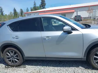 2018 Mazda CX-5 Grand Touring z VIN JM3KFADM7J0318684, wystawiony jako IAAI lot #42226937 z przebiegiem 69 166 mil mil oraz . Historia ofert i sprzedaży dostępna na DreamBid. Obrazek 13.