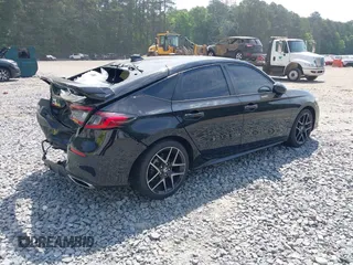 2023 Honda Civic Sport Touring z VIN 19XFL1H88PE001075, wystawiony jako IAAI lot #42212799 z przebiegiem 28 761 mil mil oraz . Historia ofert i sprzedaży dostępna na DreamBid. Obrazek 4.