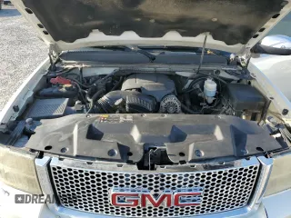 2011 GMC Sierra 1500 Denali z VIN 3GTP2XE23BG154941, wystawiony jako Copart lot #51020555 z przebiegiem 261 055 mil mil oraz Szkoda całkowita • Salvage title. Historia ofert i sprzedaży dostępna na DreamBid. Obrazek 11.