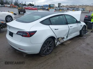 2023 Tesla Model 3 with VIN 5YJ3E1EA6PF432397, listed as a IAAI auction lot 41760895 with 15,692 mi miles and . Bid and sale history available at DreamBid. Image 4.