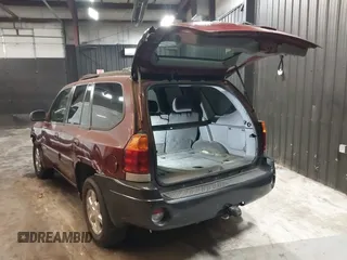 2002 GMC Envoy SLT with VIN 1GKDT13SX22426320, listed as a IAAI auction lot 41709359 with 104,418 mi miles. Bid and sale history available at carsss.com. Image 3.