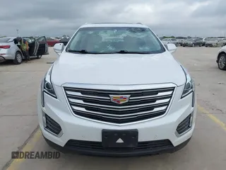 2017 Cadillac XT5 Luxury FWD z VIN 1GYKNBRS3HZ195197, wystawiony jako IAAI lot #42033419 z przebiegiem 76 709 mil mil oraz . Historia ofert i sprzedaży dostępna na DreamBid. Obrazek 12.