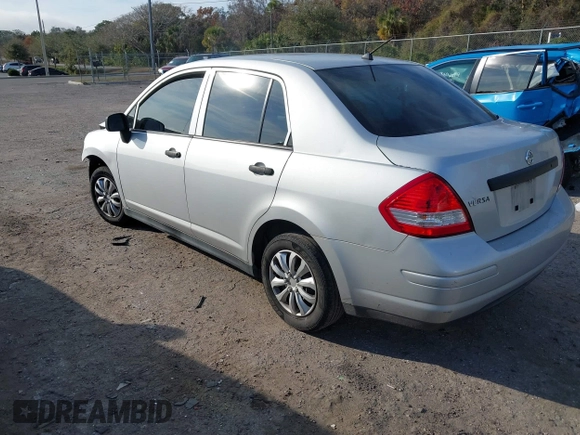 2010 Nissan Versa 1.6 with VIN 3N1CC1AP5AL422567, listed as a IAAI auction lot 41463273 with 167,038 mi miles. Bid and sale history available at carsss.com. Image 3.