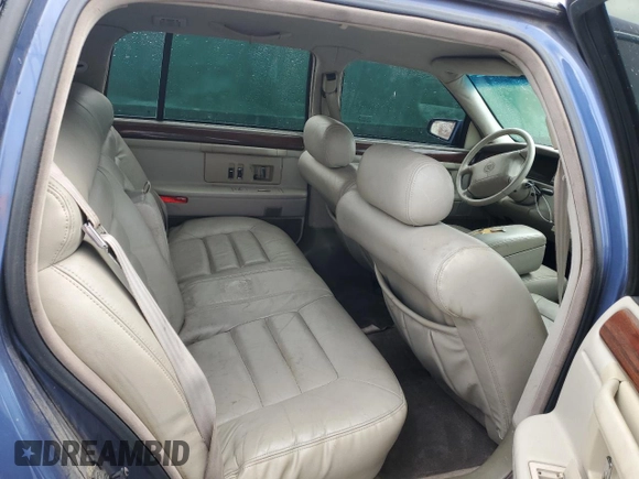 1995 Cadillac DeVille z VIN 1G6KD52B3SU243924, wystawiony jako Copart lot #56945395 z przebiegiem 72 878 mil mil oraz Szkoda całkowita • Salvage title. Historia ofert i sprzedaży dostępna na DreamBid. Obrazek 10.