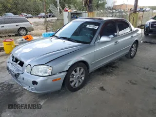 2005 Kia Optima LX z VIN KNAGD128X55420903, wystawiony jako Copart lot #78411654 z przebiegiem 85 776 mil mil oraz Szkoda całkowita • Salvage title. Historia ofert i sprzedaży dostępna na DreamBid. Obrazek 1.