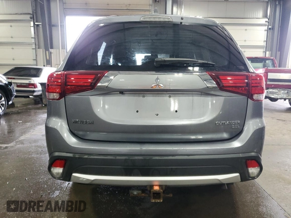 2017 Mitsubishi Outlander SE z VIN JA4AZ3A35HZ020153, wystawiony jako Copart lot #57235705 z przebiegiem 77 229 mil mil oraz Szkoda całkowita • Salvage title. Historia ofert i sprzedaży dostępna na DreamBid. Obrazek 6.