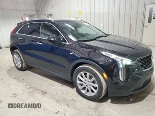 2021 Cadillac XT4 AWD Luxury with VIN 1GYFZBR42MF055788, listed as a Copart auction lot 46704275 with 23,516 mi miles and Clean Title. Bid and sale history available at carsss.com. Image 4.