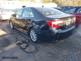 2012 Toyota Camry Hybrid XLE with VIN 4T1BD1FK3CU030064, listed as a IAAI auction lot 41872634 with 373,897 mi miles. Bid and sale history available at carsss.com. Image 6.