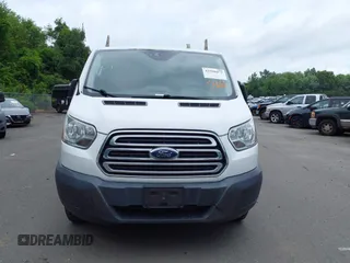 2016 Ford Transit Cargo z VIN 1FTYR2ZM6GKA03946, wystawiony jako IAAI lot #42590477 z przebiegiem 163 710 mil mil oraz . Historia ofert i sprzedaży dostępna na DreamBid. Obrazek 12.