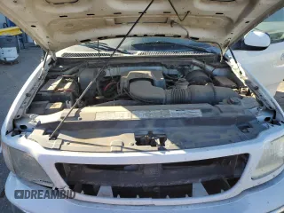1999 Ford F-150 XL с VIN 1FTRX08L3XKB18916, выставлен на аукционе Copart как лот 81892064 с пробегом 175 280 миль миль и Списание • Salvage title. История ставок и продаж доступна на DreamBid. Изображение 12.