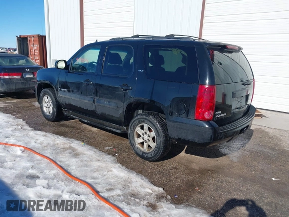 2007 GMC Yukon SLT with VIN 1GKFK13097J316933, listed as a IAAI auction lot 41330144 with 263,177 mi miles. Bid and sale history available at carsss.com. Image 3.