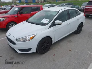 2017 Ford Focus SE z VIN 1FADP3F26HL233226, wystawiony jako IAAI lot #42004148 z przebiegiem 75 180 mil mil oraz . Historia ofert i sprzedaży dostępna na DreamBid. Obrazek 2.