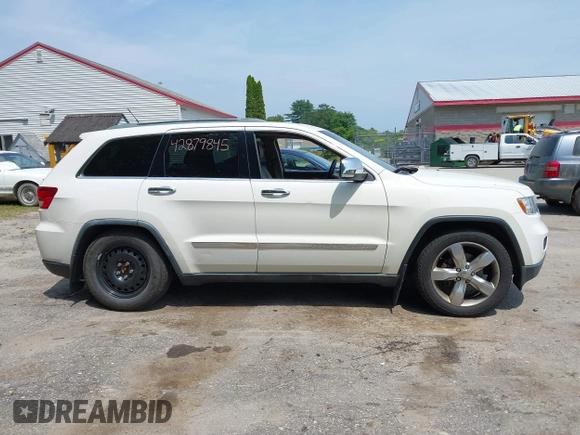 2011 Jeep Grand Cherokee Overland with VIN 1J4RR6GG3BC587857, listed as a IAAI auction lot 42879845 with 165,572 mi miles and . Bid and sale history available at DreamBid. Image 13.