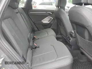 2020 Audi Q3 Premium with VIN WA1AECF31L1002342, listed as a Copart auction lot 60729665 with 29,154 mi miles and Salvage title. Bid and sale history available at DreamBid. Image 11.
