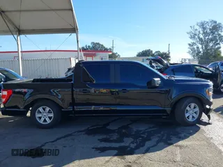 2023 Ford F-150 XL with VIN 1FTEW1C58PKF97964, listed as a IAAI auction lot 41372700 with 36,240 mi miles and . Bid and sale history available at DreamBid. Image 13.