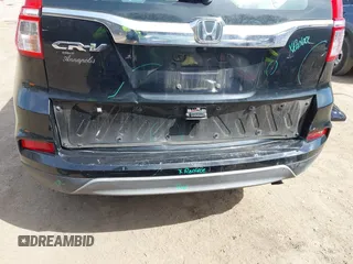 2015 Honda CR-V LX z VIN 3CZRM3H31FG703097, wystawiony jako IAAI lot #41841445 z przebiegiem 144 103 mil mil oraz . Historia ofert i sprzedaży dostępna na DreamBid. Obrazek 6.