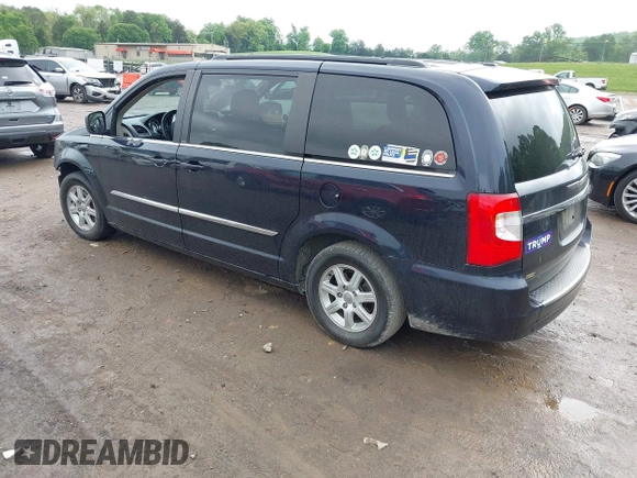 2011 Chrysler Town & Country Touring with VIN 2A4RR5DG7BR641411, listed as a IAAI auction lot 42090973 with 158,298 mi miles and . Bid and sale history available at DreamBid. Image 3.