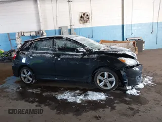 2009 Toyota Matrix S with VIN 2T1LE40E39C004676, listed as a IAAI auction lot 41366470 with 146,316 mi miles. Bid and sale history available at carsss.com. Image 13.