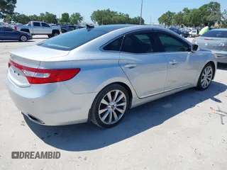 2013 Hyundai Azera z VIN KMHFH4JG6DA321882, wystawiony jako IAAI lot #42351891 z przebiegiem 59 690 mil mil oraz . Historia ofert i sprzedaży dostępna na DreamBid. Obrazek 4.