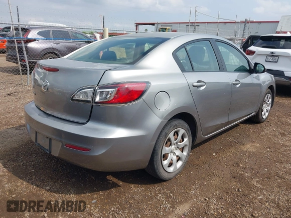 2012 Mazda 3 i Sport with VIN JM1BL1UF4C1535447, listed as a IAAI auction lot 42073084 with 121,185 mi miles and . Bid and sale history available at DreamBid. Image 4.