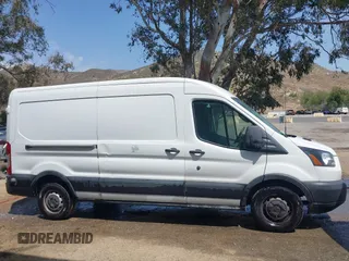 2019 Ford Transit with VIN 1FTYR2CM5KKB19415, listed as a IAAI auction lot 42129144 with 198,457 mi miles and . Bid and sale history available at DreamBid. Image 12.