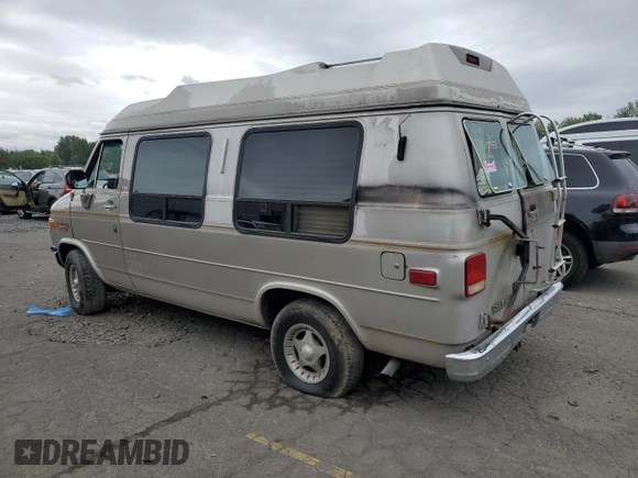 1992 Chevrolet Chevy Van с VIN 1GBEG25K2N7130047, выставлен на аукционе Copart как лот 68682724 с пробегом 143 585 миль миль и Списание • Salvage title. История ставок и продаж доступна на DreamBid. Изображение 2.