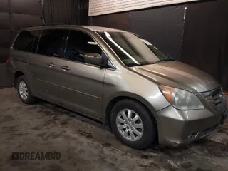 2009 Honda Odyssey EX-L with VIN 5FNRL38689B406342, listed as a IAAI auction lot 41726945 with 98,769 mi miles. Bid and sale history available at carsss.com. Image 1.