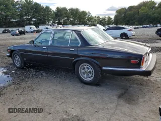 1986 Jaguar XJ z VIN SAJAV1341GC458926, wystawiony jako Copart lot #73985024 z przebiegiem 73 337 mil mil oraz Czysty tytuł • Clean title. Historia ofert i sprzedaży dostępna na DreamBid. Obrazek 2.