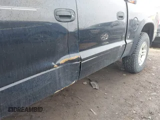 2004 Dodge Dakota Sport with VIN 1D7HL38N94S538692, listed as a IAAI auction lot 41843739 with 198,719 mi miles. Bid and sale history available at carsss.com. Image 14.