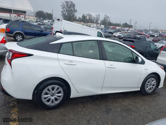 2021 Toyota Prius L Eco with VIN JTDKAMFU6M3141019, listed as a IAAI auction lot 41821212 with 202,756 mi miles. Bid and sale history available at carsss.com. Image 13.