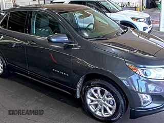 2020 Chevrolet Equinox LT z VIN 2GNAXJEV5L6232400, wystawiony jako IAAI lot #42575814 z przebiegiem 110 520 mil mil oraz . Historia ofert i sprzedaży dostępna na DreamBid. Obrazek 27.