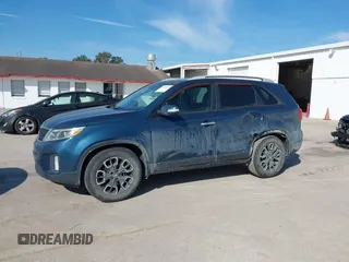 2014 Kia Sorento LX with VIN 5XYKT4A71EG462295, listed as a IAAI auction lot 41508742 with 144,234 mi miles and . Bid and sale history available at carsss.com. Image 14.