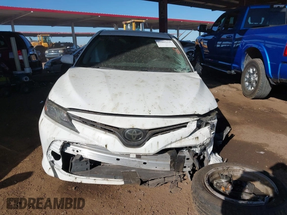 2020 Toyota Camry LE with VIN 4T1C11AK7LU401666, listed as a IAAI auction lot 41865235 with 69,189 mi miles. Bid and sale history available at carsss.com. Image 12.