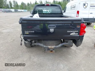 2009 Dodge Dakota with VIN 1D7HW32P09S798360, listed as a IAAI auction lot 42426400 with 50,988 mi miles and . Bid and sale history available at DreamBid. Image 6.
