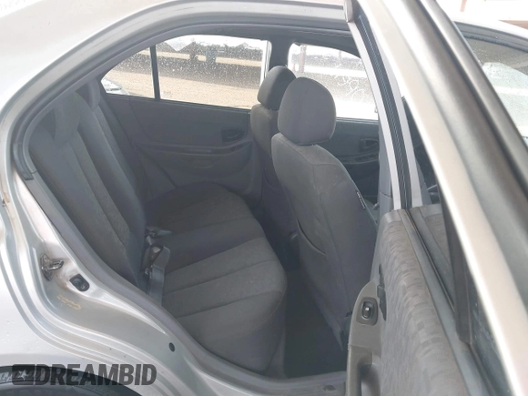 2003 Hyundai Accent GL with VIN KMHCG45C93U476176, listed as a IAAI auction lot 41940608 with 212,264 mi miles. Bid and sale history available at carsss.com. Image 8.