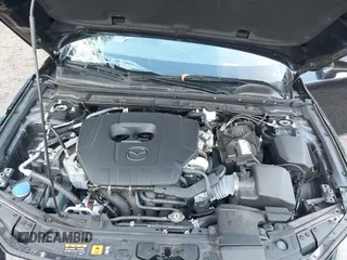 2023 Mazda 3 S Preferred with VIN 3MZBPACM6PM358989, listed as a IAAI auction lot 41120246 with 27,290 mi miles and . Bid and sale history available at DreamBid. Image 10.