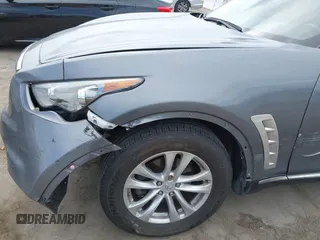 2014 Infiniti QX70 with VIN JN8CS1MU8EM450428, listed as a IAAI auction lot 42233727 with 88,342 mi miles and . Bid and sale history available at DreamBid. Image 18.