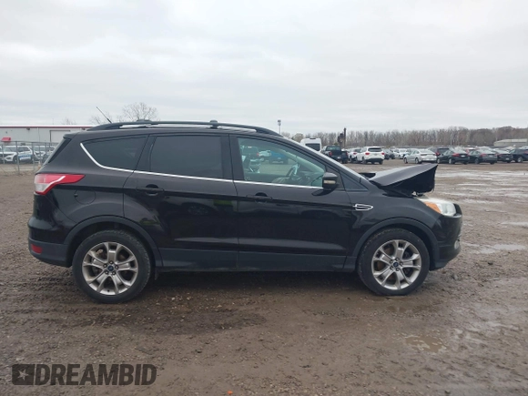 2013 Ford Escape SEL with VIN 1FMCU9H95DUC64995, listed as a IAAI auction lot 40821020 with 120,114 mi miles. Bid and sale history available at carsss.com. Image 13.