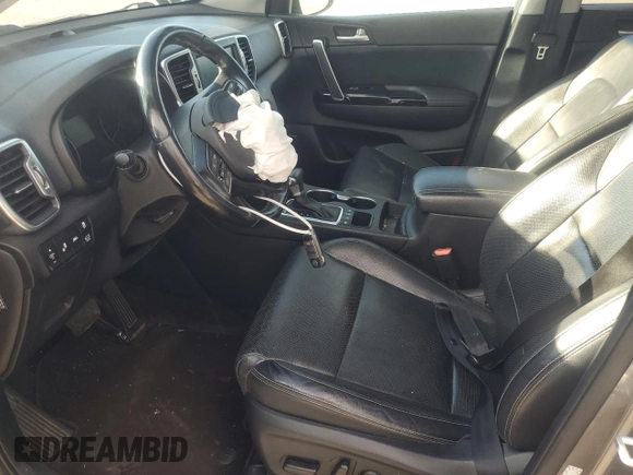 2018 Kia Sportage EX z VIN KNDPNCAC1J7308457, wystawiony jako Copart lot #81574704 z przebiegiem Nie podano mil oraz Szkoda całkowita • Salvage title. Historia ofert i sprzedaży dostępna na DreamBid. Obrazek 7.
