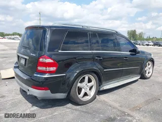 2009 Mercedes-Benz GL-Class 5.5L with VIN 4JGBF86E49A458359, listed as a IAAI auction lot 41808818 with 114,048 mi miles. Bid and sale history available at carsss.com. Image 4.