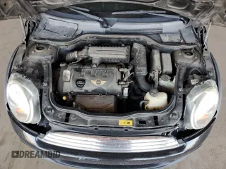2011 MINI Hardtop z VIN WMWSU3C54BT253827, wystawiony jako Copart lot #57712835 z przebiegiem 150 016 mil mil oraz Czysty tytuł • Clean title. Historia ofert i sprzedaży dostępna na DreamBid. Obrazek 11.