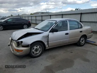 1997 Toyota Corolla with VIN 1NXBA02E7VZ509125, listed as a Copart auction lot 50098145 with 191,319 mi miles and Salvage title. Bid and sale history available at DreamBid. Image 1.