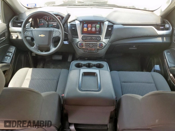 2019 Chevrolet Suburban with VIN 1GNSCKEC9KR230768, listed as a Copart auction lot 58822915 with 96,823 mi miles and Salvage title. Bid and sale history available at DreamBid. Image 8.