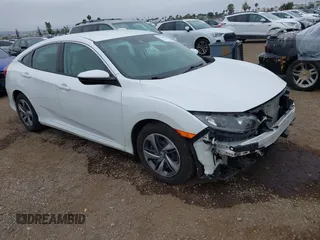 2020 Honda Civic LX z VIN 2HGFC2F67LH558311, wystawiony jako IAAI lot #42442683 z przebiegiem 14 855 mil mil oraz . Historia ofert i sprzedaży dostępna na DreamBid. Obrazek 1.