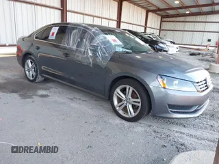 2014 Volkswagen Passat SE z VIN 1VWBN7A32EC059503, wystawiony jako IAAI lot #40876045 z przebiegiem Nie podano mil oraz . Historia ofert i sprzedaży dostępna na DreamBid. Obrazek 1.