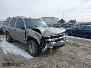 1998 Chevrolet Tahoe with VIN 1GNEK13R4WJ346417, listed as a IAAI auction lot 41390436 with 184,094 mi miles. Bid and sale history available at carsss.com. Image 6.