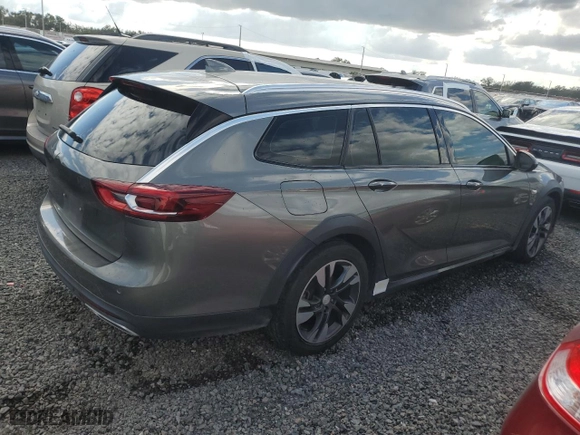 2019 Buick Regal TourX Essence with VIN W04GV8SX0K1013461, listed as a Copart auction lot 77276214 with NaN miles and Salvage Title. Bid and sale history available at carsss.com. Image 3.